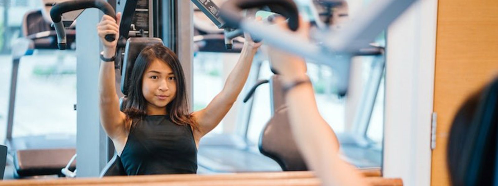 Girl working out in a gym